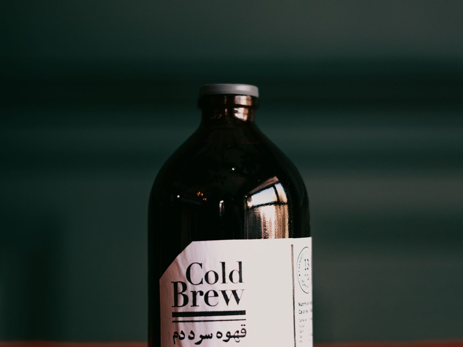 Cold brew coffee steeping in a bottle at home