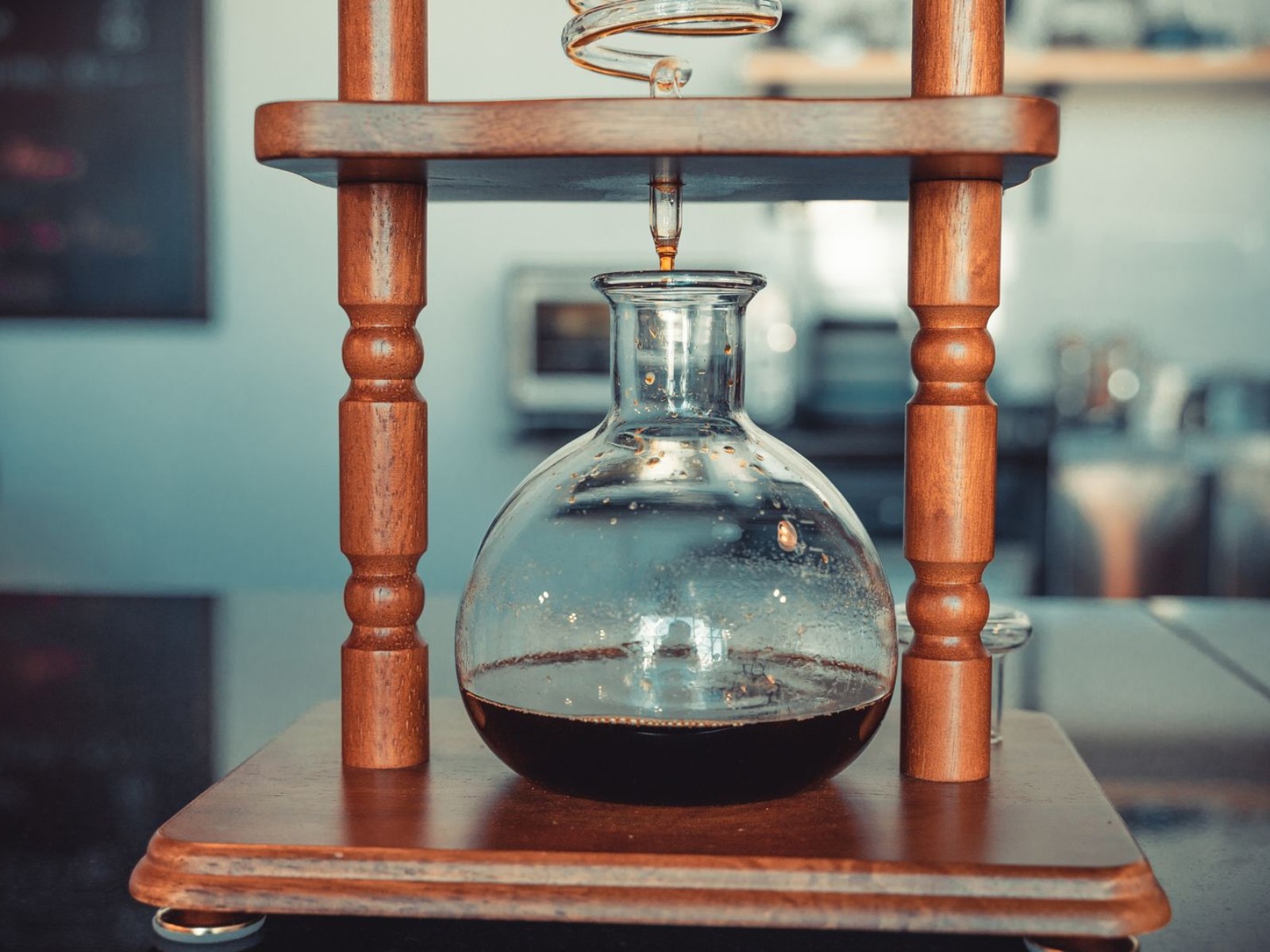 Fresh coffee brewing and dripping into a carafe