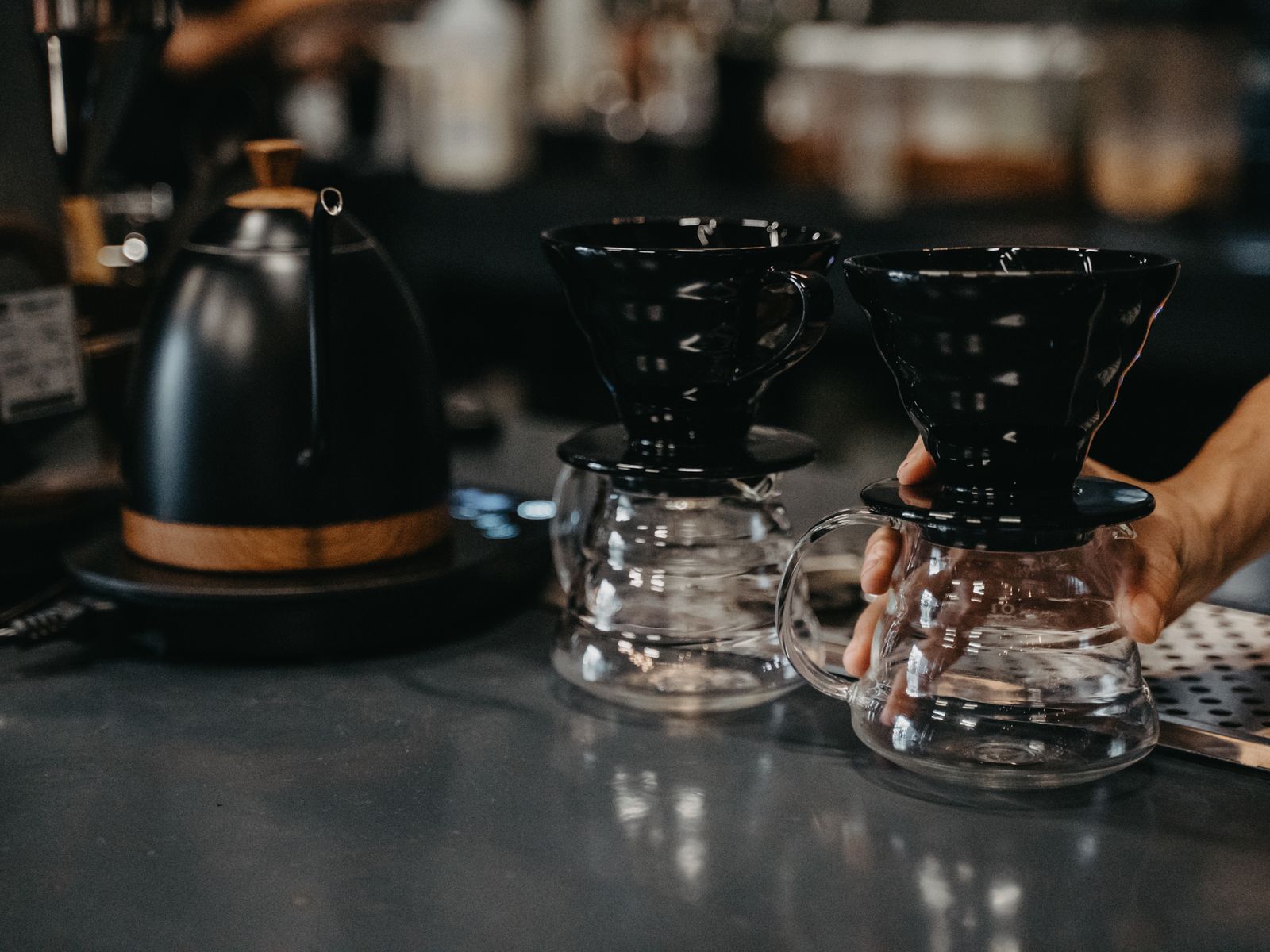 Drip coffee makers set up in a cafe, a method that does not need a gooseneck kettle
