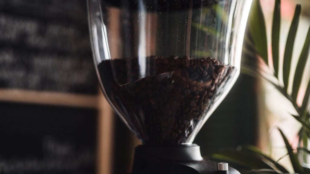 Sleek electric coffee grinder on a counter