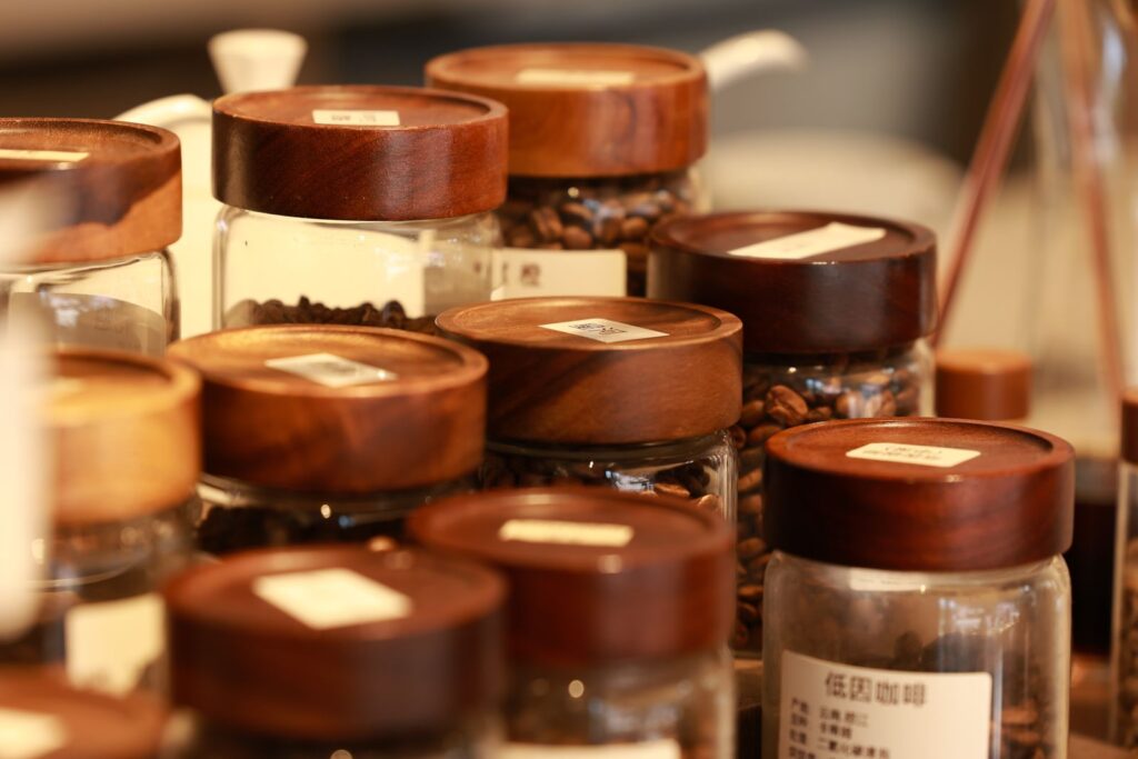 Coffee bean jars with wooden lids used to store coffee beans fresh