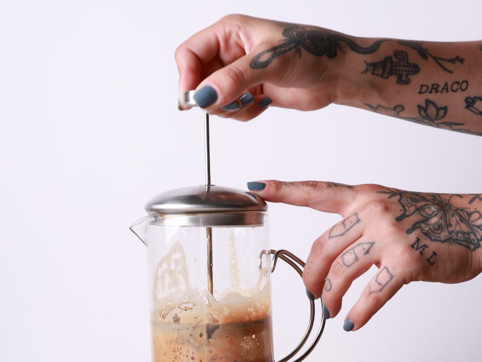 A French press plunger, which needs full disassembly to clean the mesh