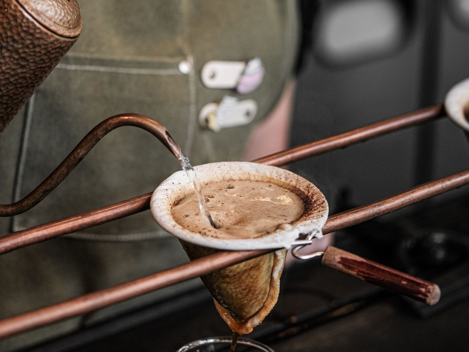 Water poured through a cloth coffee filter for a clean, full-bodied cup