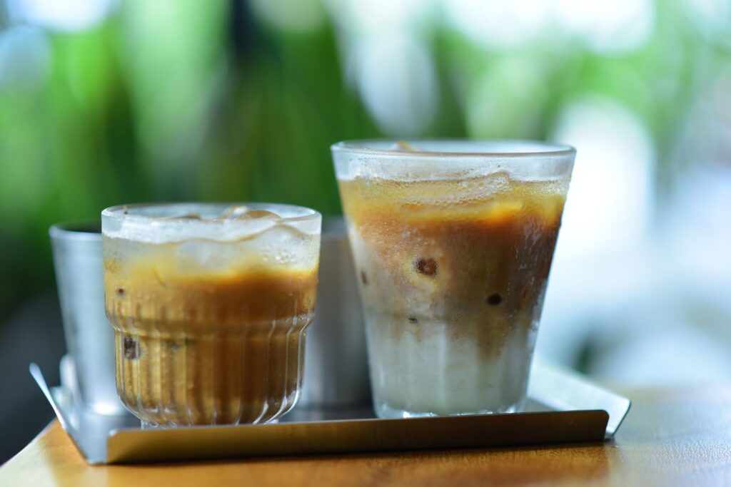 Cold brew vs iced coffee shown in two glasses side by side