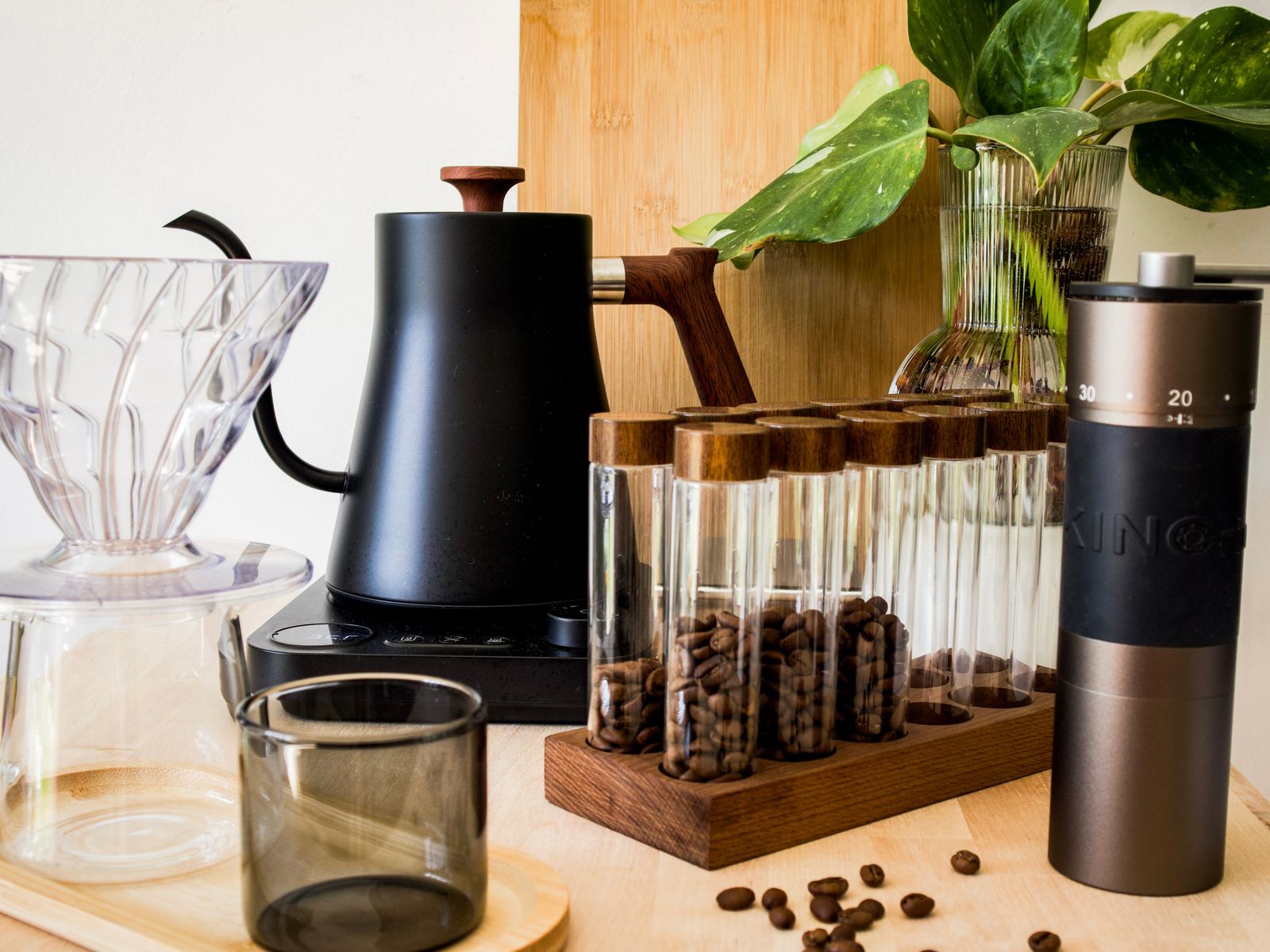 Compact manual brewers and a hand grinder that suit a small coffee corner