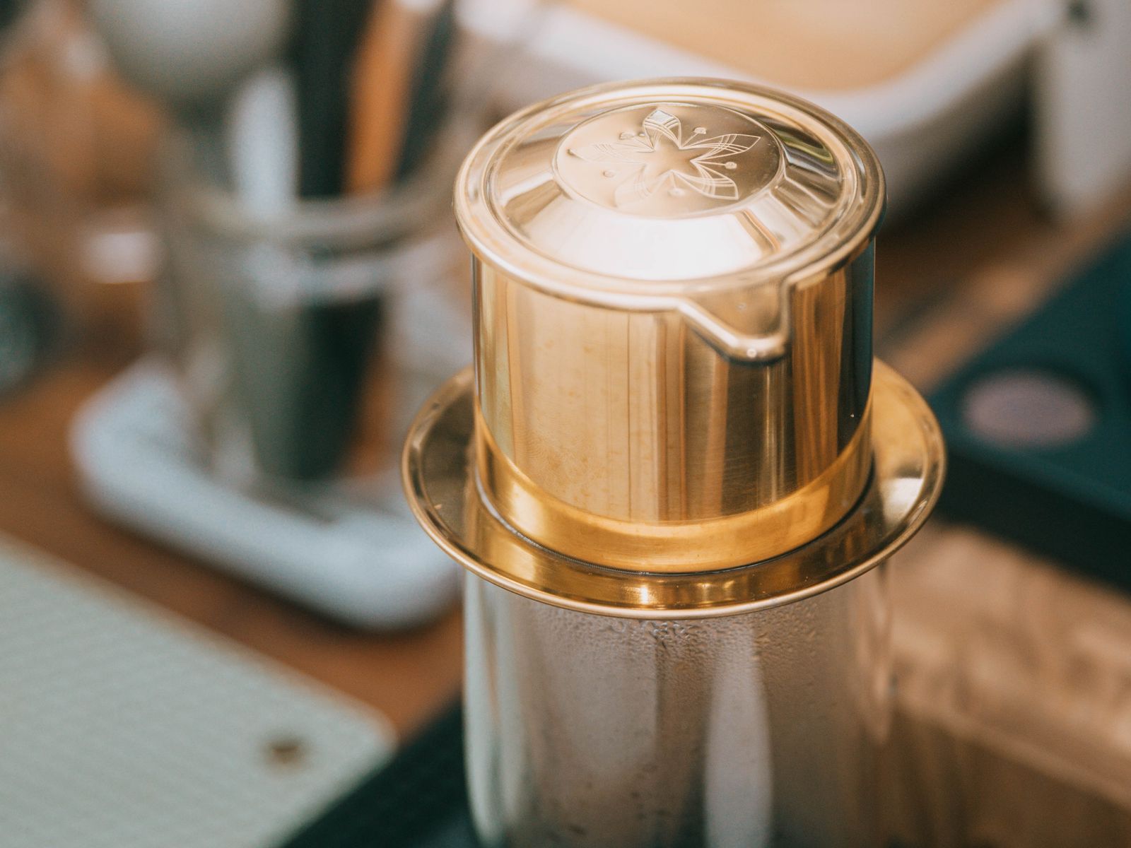 Brewing coffee through a reusable metal coffee filter